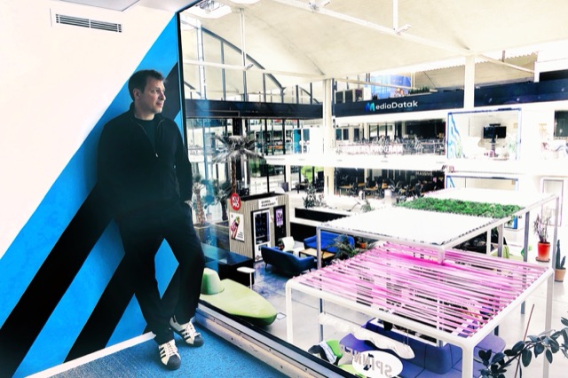Samuel Zniber overlooking the Station F campus floor, Paris